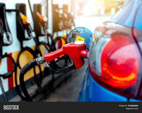 Pump operation at a car filling station - sound effect