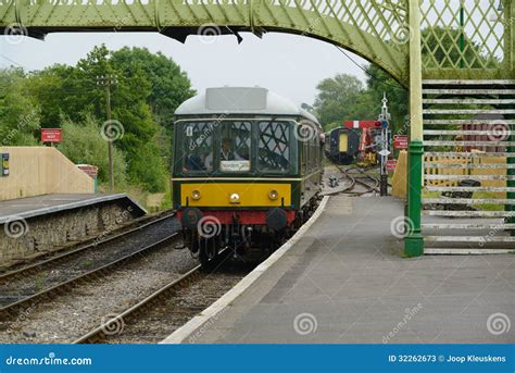 Diesel train arrives at the station: stops, disembarking passengers - sound effect