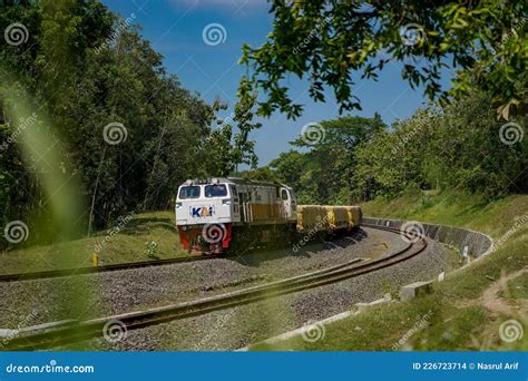 Freight train passes from left to right - sound effect