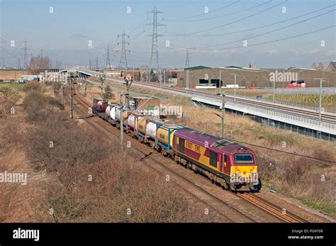 Freight locomotive approaching and passing - sound effect