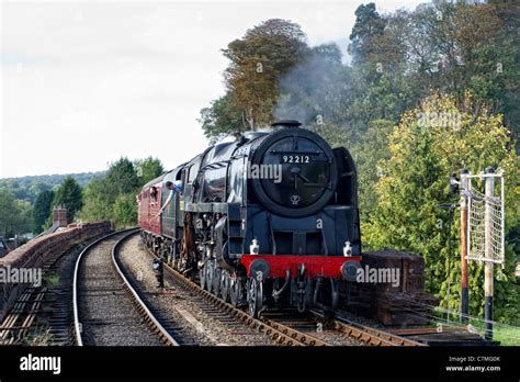 Steam locomotive approaches and stops - sound effect