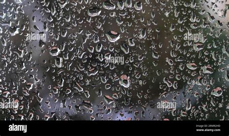 Rain dripping on the car glass (2) - sound effect