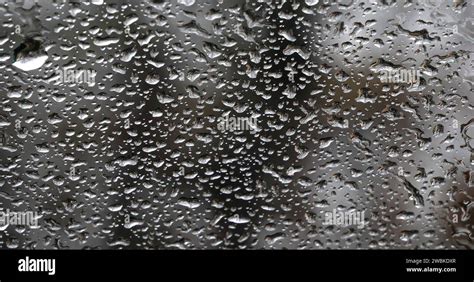 Rain dripping on the car glass - sound effect