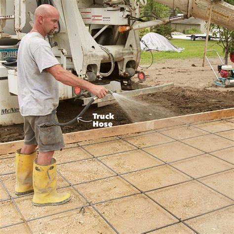 Jet of water from hose pours onto concrete - sound effect