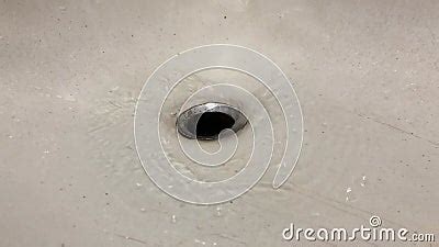 Descent of water in the bathroom, drain into the hole - sound effect