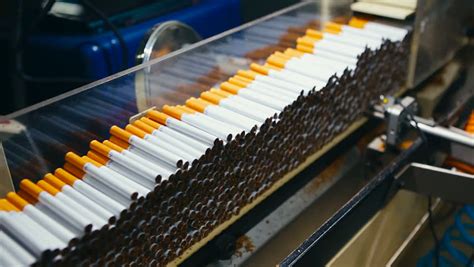 Tobacco factory, cigarette production: machine operation (2) - sound effect