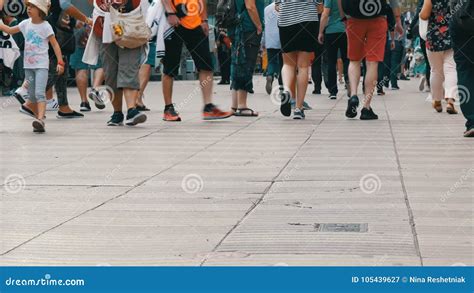 Crowd, pedestrian traffic, footsteps, voices - sound effect