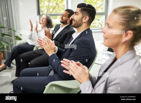 Sound of applause in the room: a large crowd at a concert