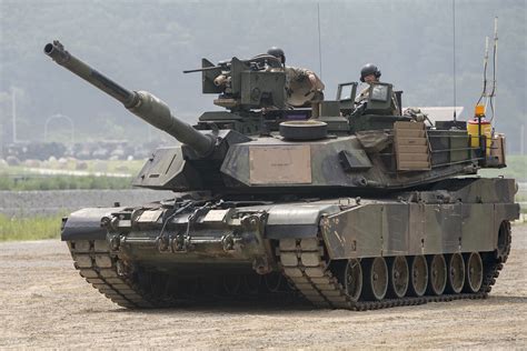 Military tank m-1: approach, sound of caterpillars