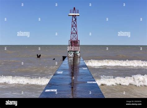 Waves of lake beat against concrete pier, harbor - sound effect