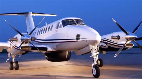 Twin-propeller aircraft king air: flies by - sound effect