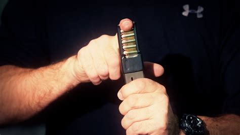 Inserting a clip into a gun - sound effect