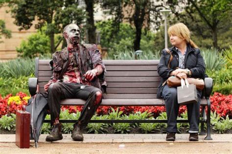 Zombies during the day on the street, against the background of a bird - sound effect