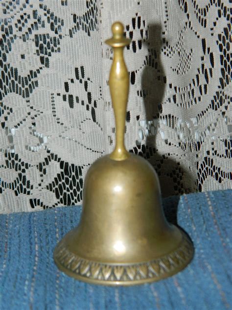 Ringing of a small brass bell - sound effect
