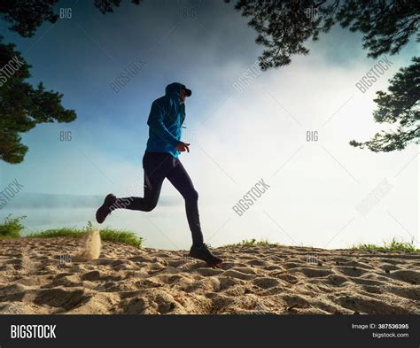 Sound of a man running (on a hard surface)