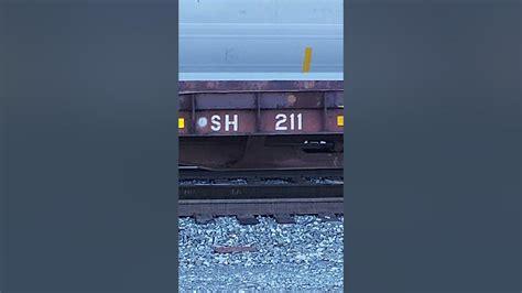 Sound of a train freight car (metal creaking)