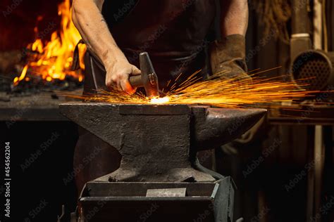 Sound of the forge: sound of a hammer, the grinding of iron