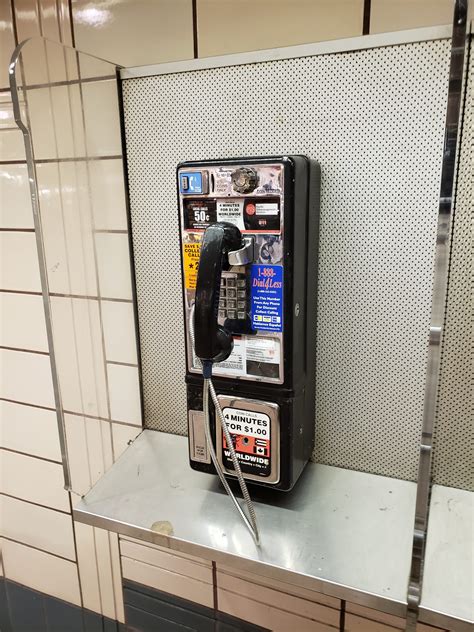 Sound of dialing a number in a payphone from 1 to 5, a street phone