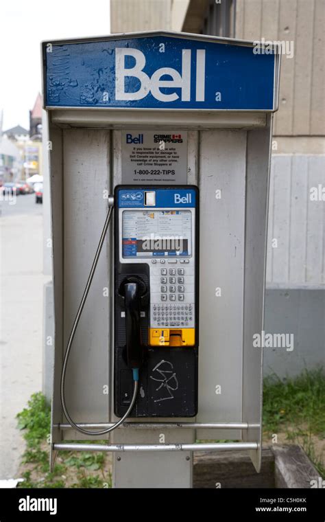 Sound of dialing a number in a payphone from 1 to 5, a street phone