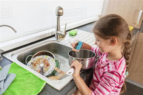 Sound of the sink for washing dishes in the kitchen