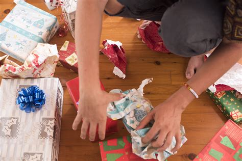 Sound of tearing wrapping paper, opening a gift