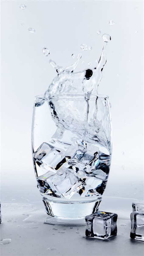 Sound of shaking liquid in a glass with ice cubes