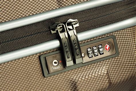 Sound of a suitcase latch, luggage bag