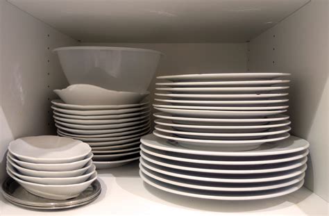 Sounds of dishes in the kitchen: the clinking of plates, washing in the sink