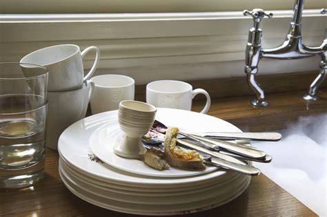 Sounds of dishes in the kitchen: the clinking of plates, washing in the sink