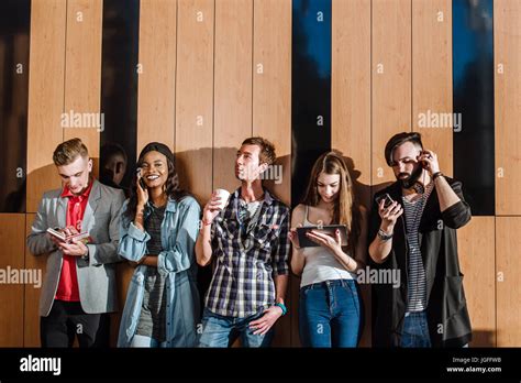 Group of people in a large room: whistle - sound effect