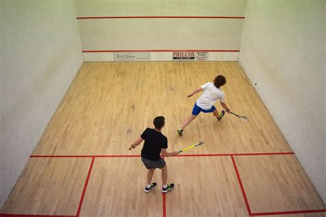 Playing squash: hitting the ball, squeaking shoes on the floor - sound effect