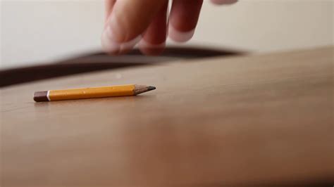 Pencil rolling on the table - sound effect