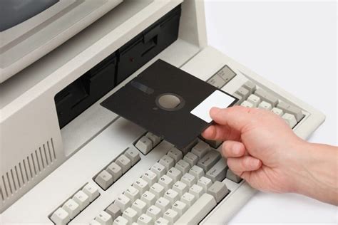 Computer, floppy disk, disk drive sound, office
