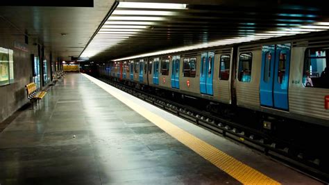 Metro: train rides in a tunnel, wheels creak - sound effect