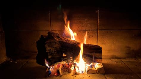 Wet firewood burns in the fireplace, hissing - sound effect