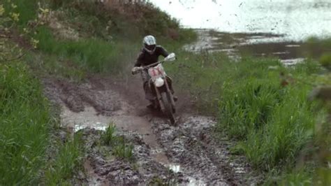 Motorcycle moves through mud (slowly) - sound effect