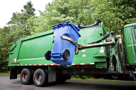 Garbage truck is approaching and passing by - sound effect