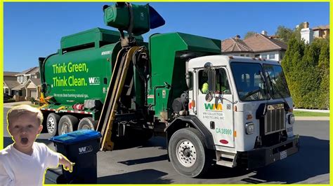 Garbage truck pulls off and drives off to the right - sound effect