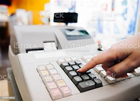 Pressing buttons on a cash register, printing a receipt - sound effect