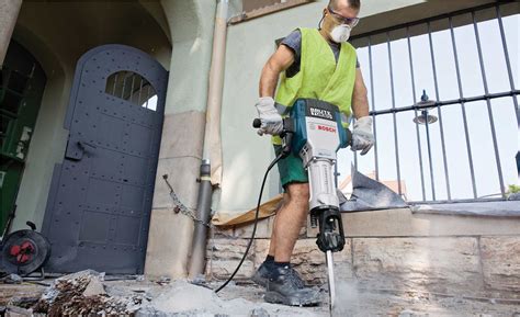 Jackhammer on the background of construction - sound effect