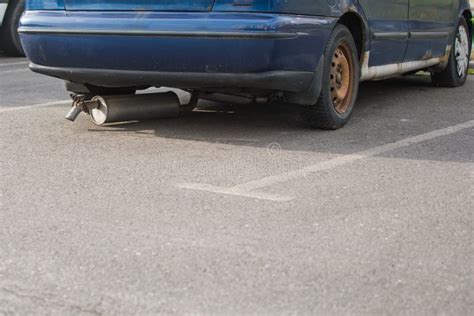 Torn muffler dragging on the asphalt - sound effect