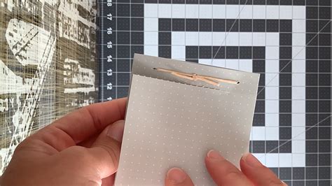 Tear off a sheet of paper along the perforation, cut - sound effect