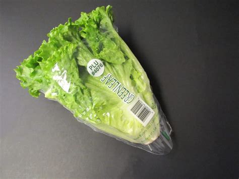 Transfer the lettuce package to a bowl.   - sound effect