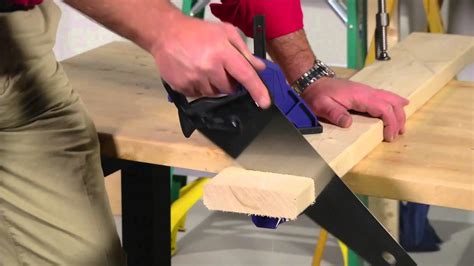 Sawing wood with a hand saw - sound effect