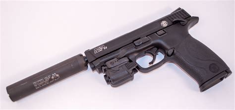 Silenced 22 caliber pistol: multiple shots - sound effect
