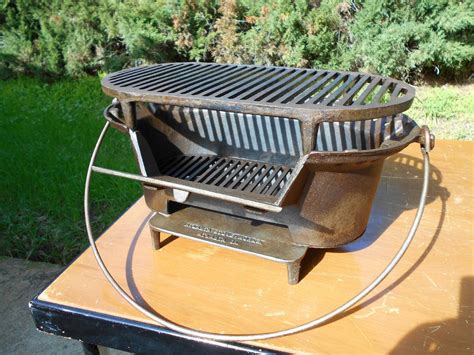 Antique cast iron stove, metal grill sound (grill)