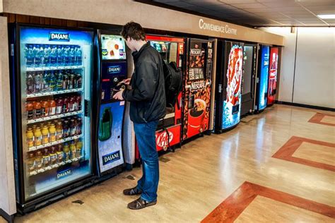 Buying a drink from a vending machine - sound effect