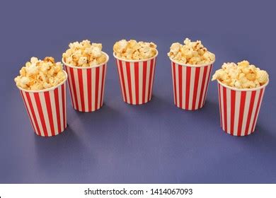 Popcorn poured into a plastic cup - sound effect