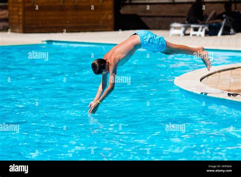 Jumping from the board into the water, swimming - sound effect