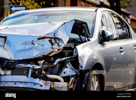 Crushing blow to the hood of a car in a car accident - sound effect